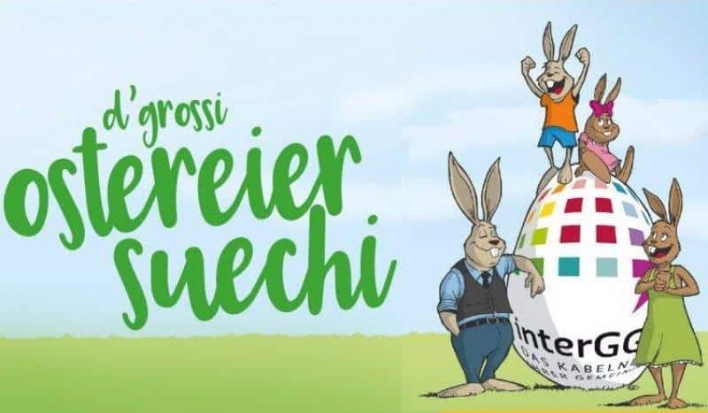 Large Easter Eggs 4 Ilustracja zająców i ogromnego pisanki na trawie z napisem