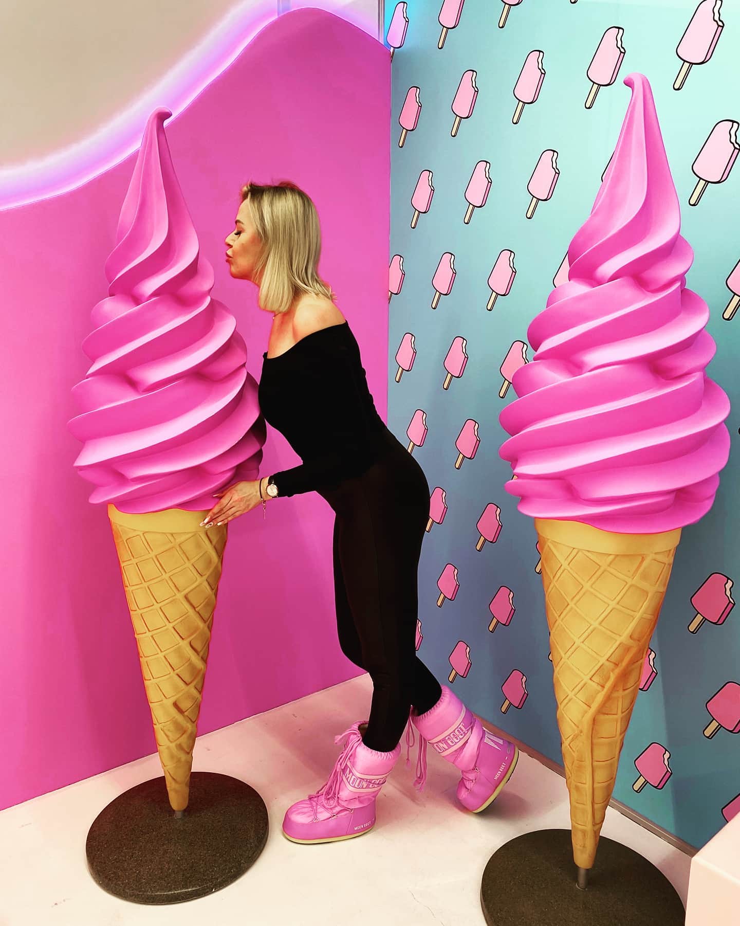Advertising Soft Ice Cream Fiberglass Figure 4 Woman in black outfit and pink boots posing with large pink ice cream cone sculptures against a colorful background.
