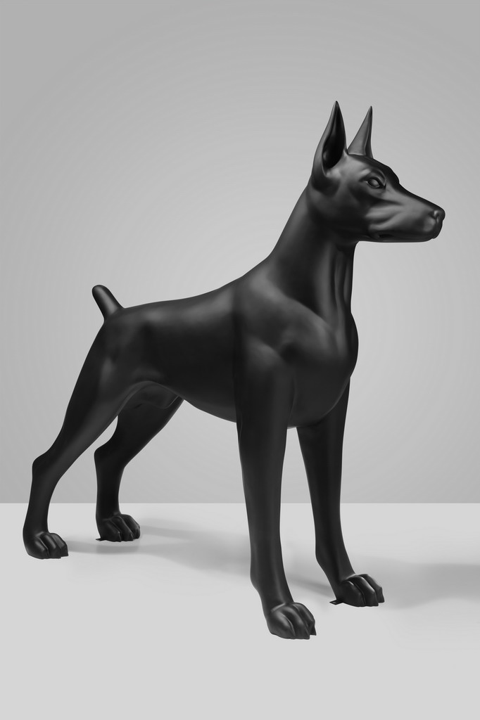 Large Doberman Fiberman Figure - Single Color Edition 3 Statue of a sleek black dog with pointed ears, standing on a gray background.