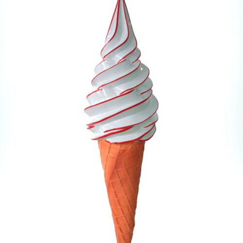 White soft serve ice cream cone with red stripes in a waffle cone.
