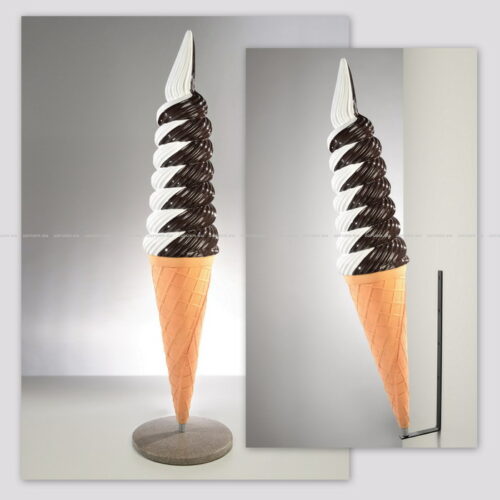 Large swirl chocolate and vanilla soft serve ice cream cone sculpture with a waffle cone base, standing upright on a flat circular base.