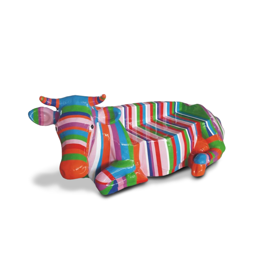 Fiberglass Cow Shaped Bench - Color Stripes Edition 1 Colorful cow-shaped bench with multicolored stripes on a white background.