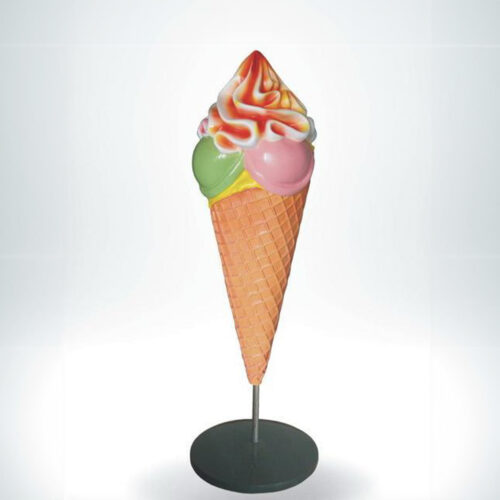 A large, colorful ice cream cone sculpture featuring scoops in green, pink, and yellow, topped with swirled red and white ice cream, mounted on a black circular base.
