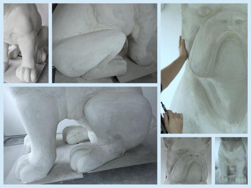 Outdoor Spatial Advertising - Giant Bulldog Model 4 Rzeźba psa w trakcie tworzenia, przedstawiająca szczegóły nóg, łap i pyska.