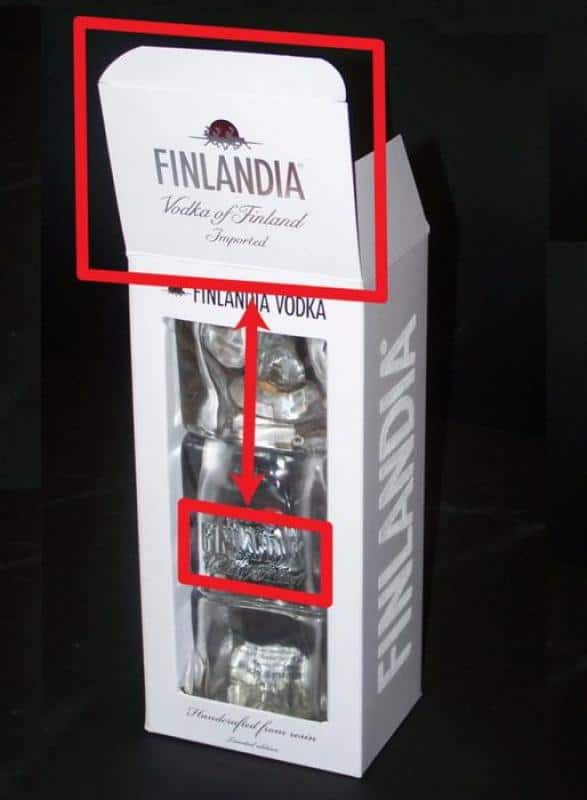 Promotional packaging Finlandia 4 Białe opakowanie Finlandia Vodka z przezroczystym okienkiem i szklanką wewnątrz.