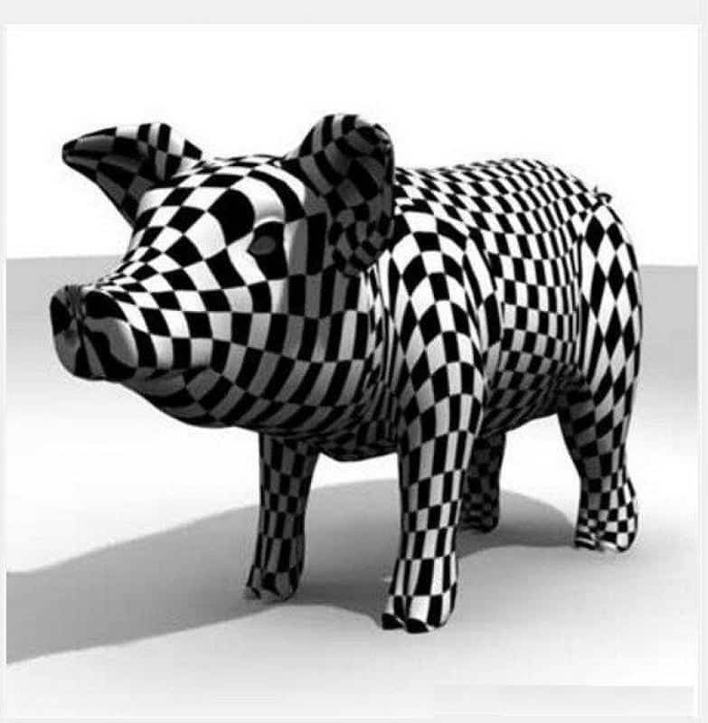 Artistically painted animal figures 2 Figurka świni pokryta czarno-białym wzorem w kratkę.