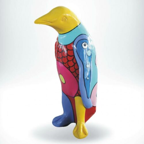Colorful penguin statue with abstract patterns and vibrant colors, including yellow, red, blue, pink, and green, standing against a plain white background.
