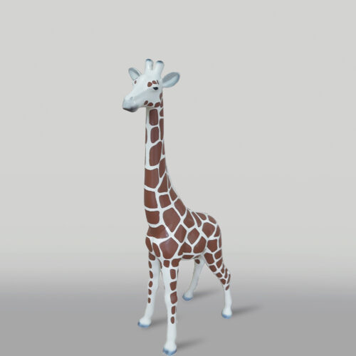 Toy giraffe figurine with brown and white spotted pattern against a plain background.