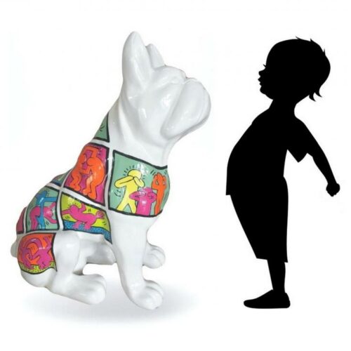 Silhouette of a child next to a white statue of a French Bulldog adorned with colorful cartoon-like illustrations.