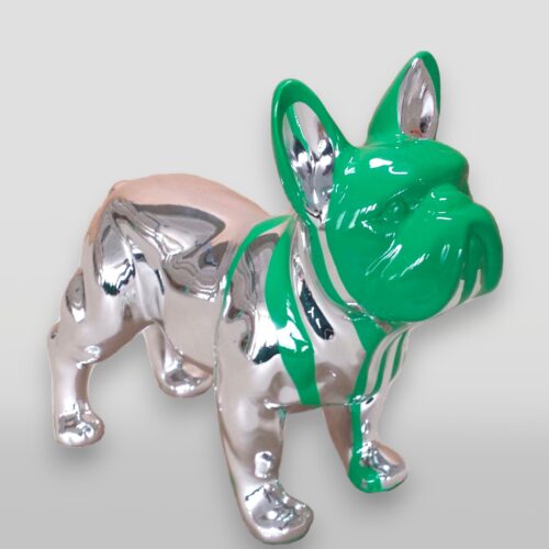 Silver dog figurine with green accents on the head, neck, and ears.