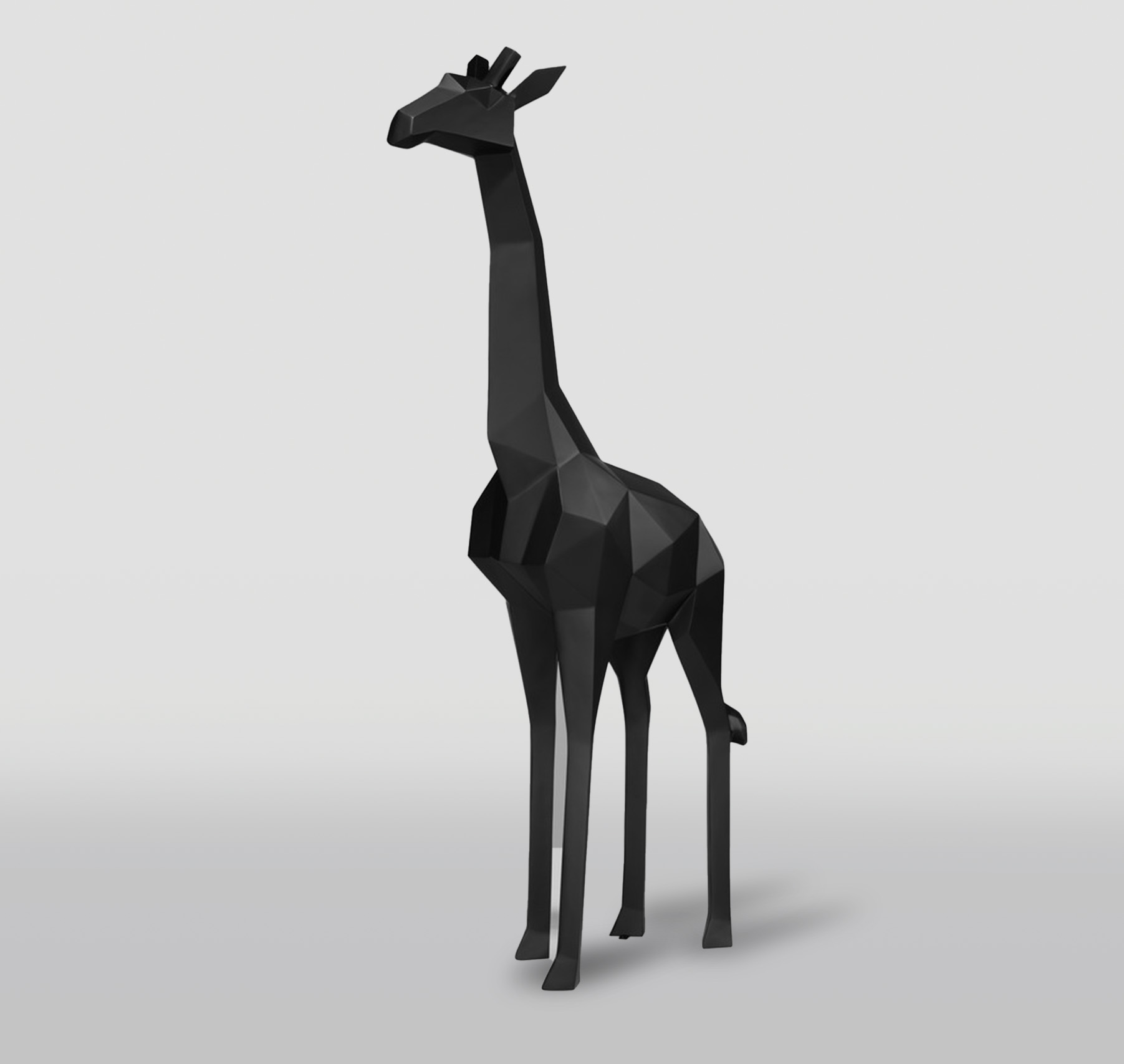 Large geometric fiberglass giraffe statue 1 Black low-poly giraffe sculpture on a plain background.