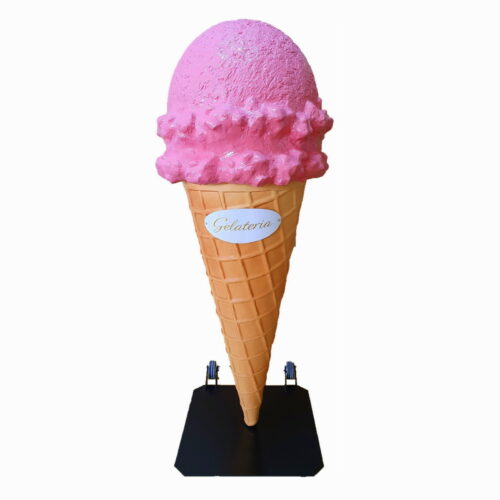 Large pink ice cream cone statue with 
