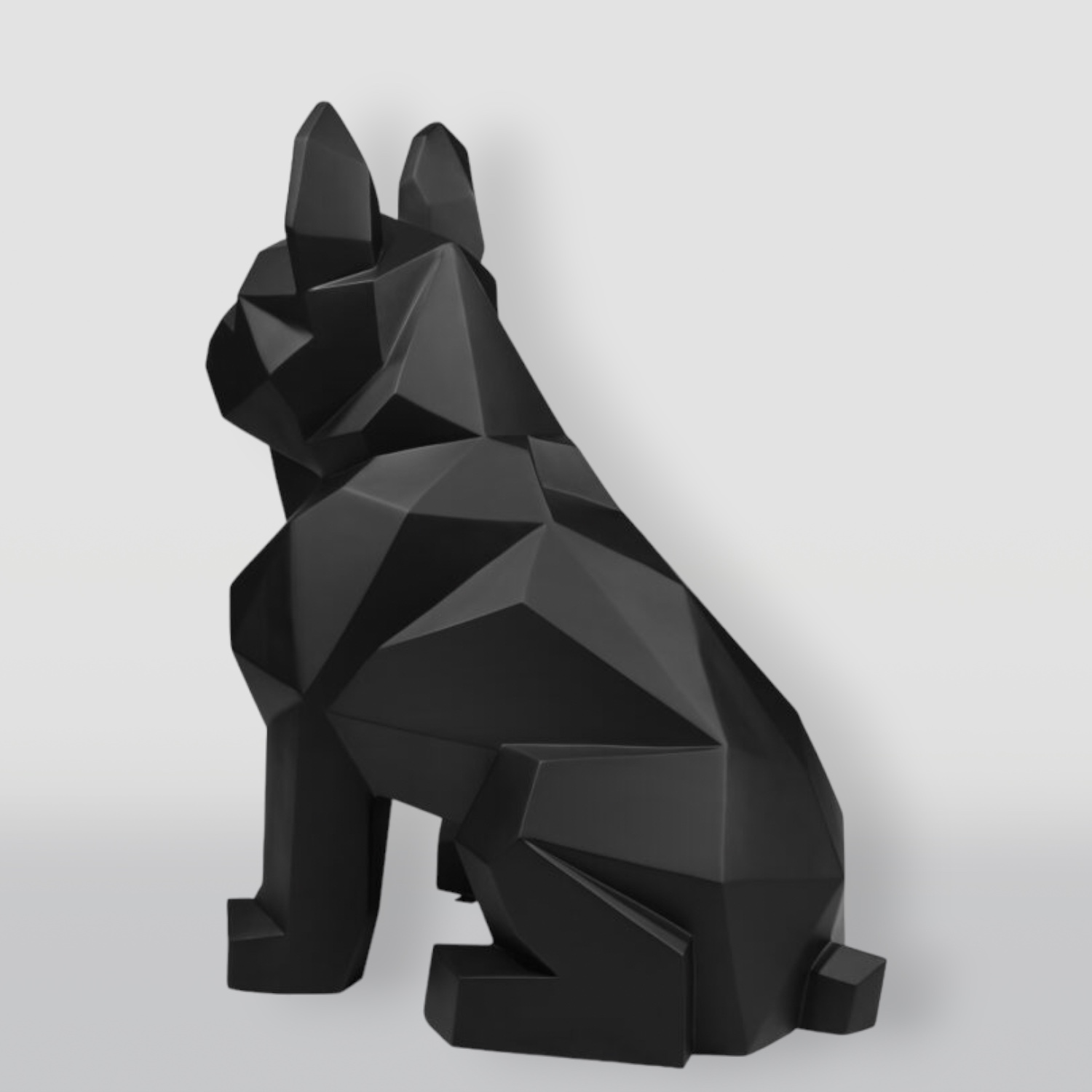 Geometric Fiberglass French Bulldog Sculpture - Single Color 3 Black geometric dog sculpture sitting on a white background.
