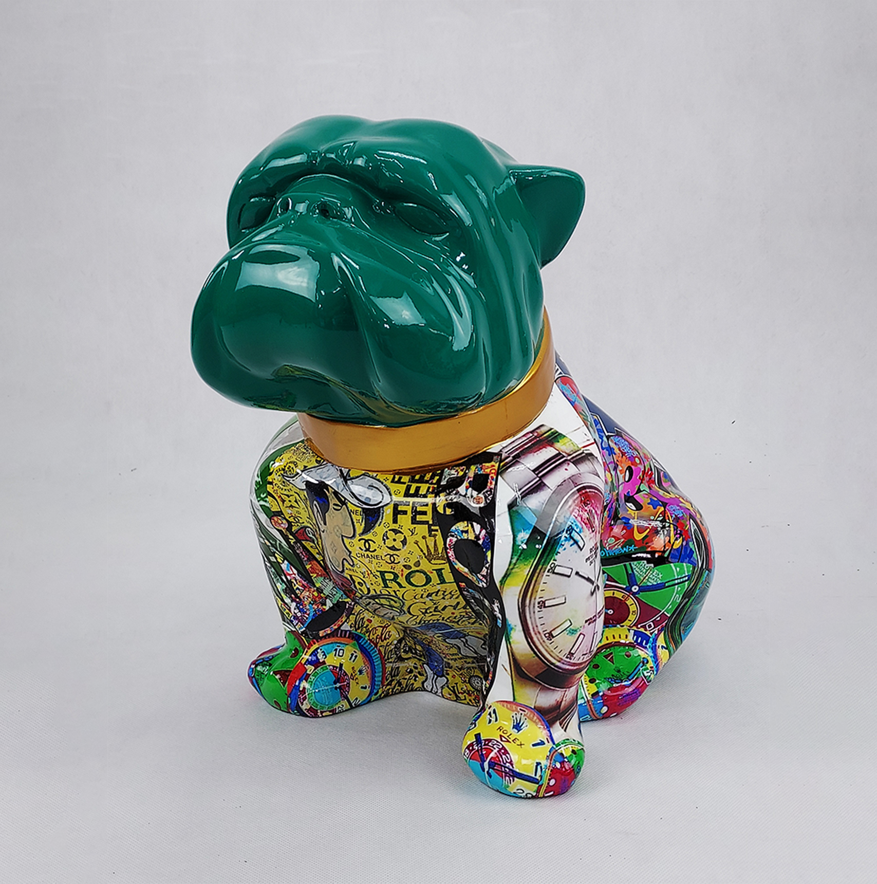 Bulldog Angelo 40cm dog - Rolex 1 Colorful bulldog statue with a glossy green head and abstract, collage-like designs on its body, featuring various watches and other patterns.
