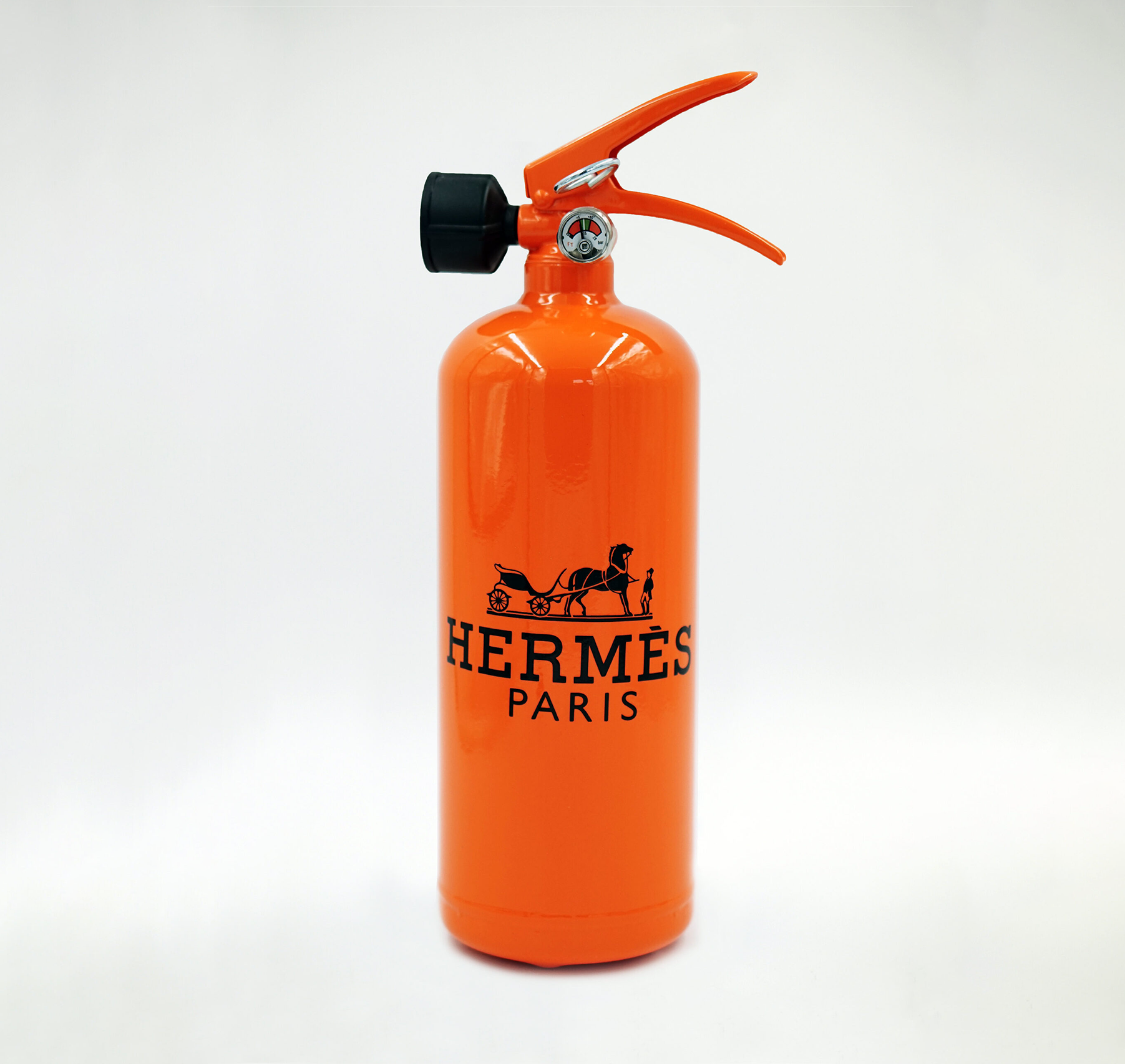 Fire Extinguisher 2kg - H 1 An orange fire extinguisher with the