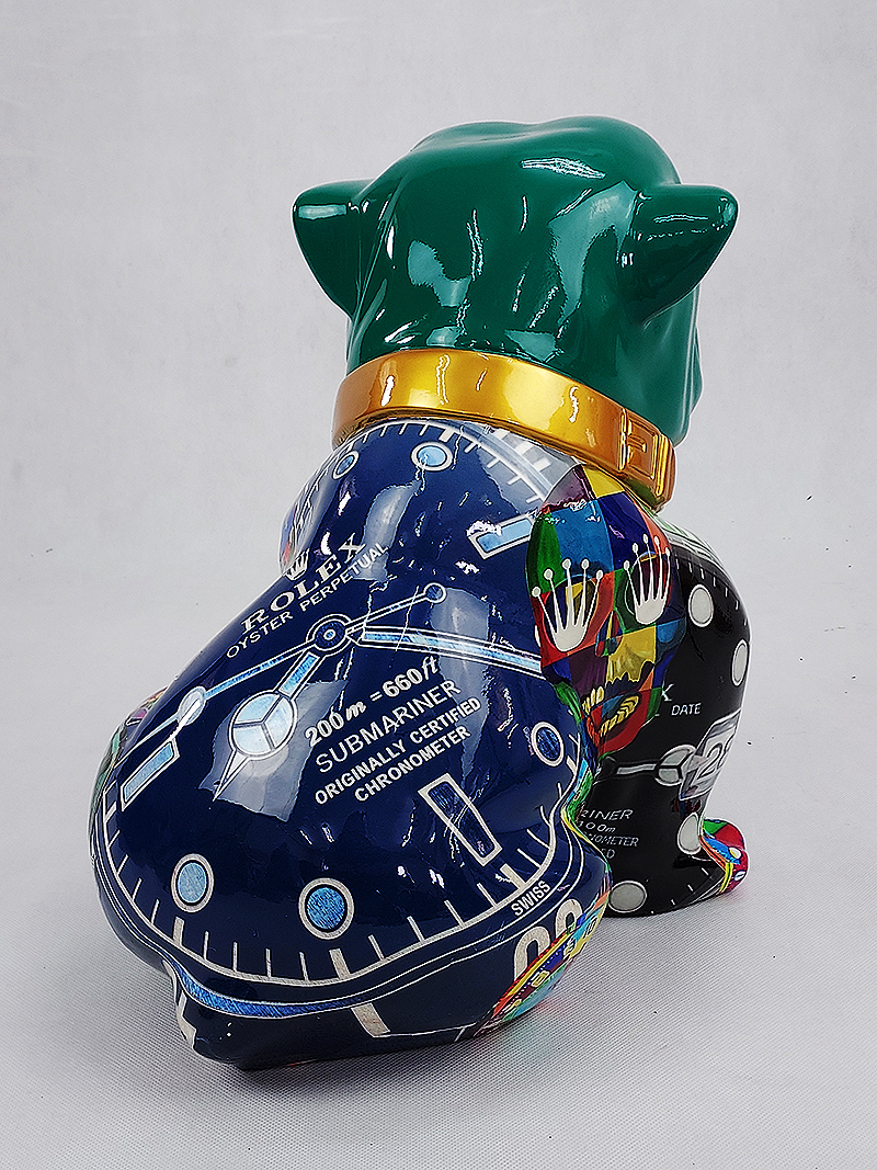 Bulldog Angelo 60cm dog - Rolex 3 Colorful sculpture of a dog wearing a coat resembling the dial of a Rolex Submariner watch.