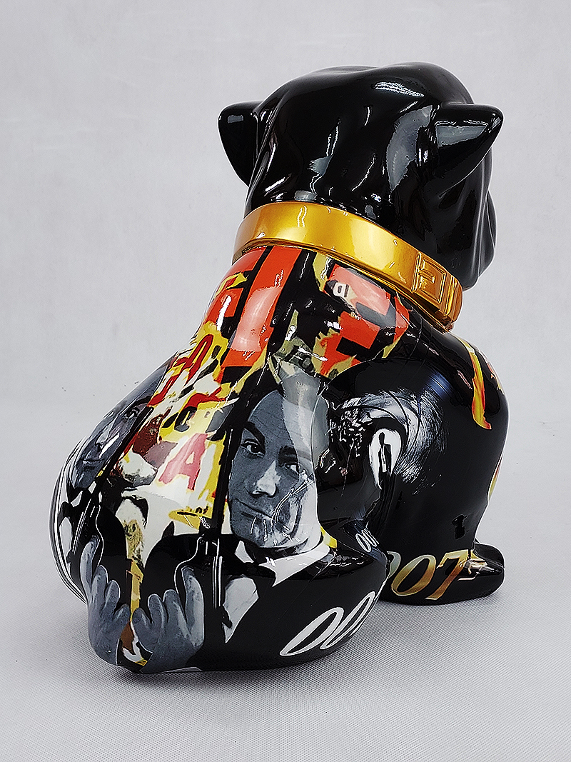 Bulldog Angelo 60cm dog - James Bond 2 Black ceramic bulldog piggy bank with a glossy finish and a gold collar, featuring a collage of black-and-white and colorful images on its back.