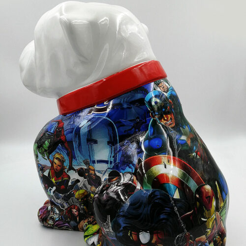 White ceramic dog figurine with a red collar, decorated with Marvel superhero comic images.