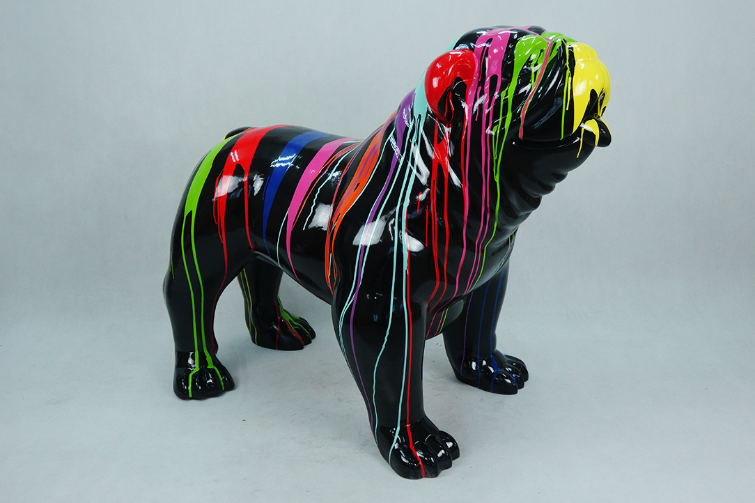 Bulldog USA XL Dog - Black Trash 1 Sculpture of a bulldog painted glossy black with colorful paint streaks in green, yellow, red, blue, pink, and orange dripping over it.