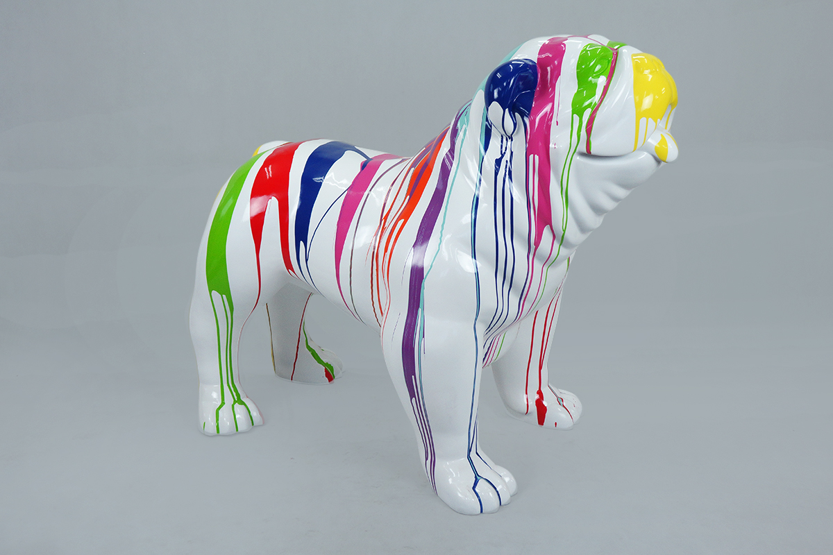 Bulldog USA XL Dog - White Trash 1 A white dog statue with colorful paint drips in various colors including green, red, blue, pink, purple, and yellow.