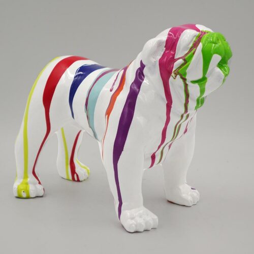 White bulldog figurine with colorful paint drips in red, yellow, purple, blue, and green.