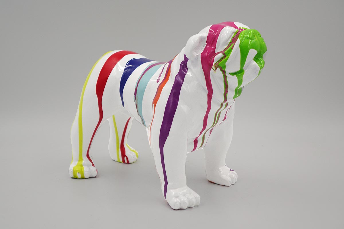 Bulldog USA XS Dog - White Trash 1 White bulldog figurine with colorful paint drips in red, yellow, purple, blue, and green.