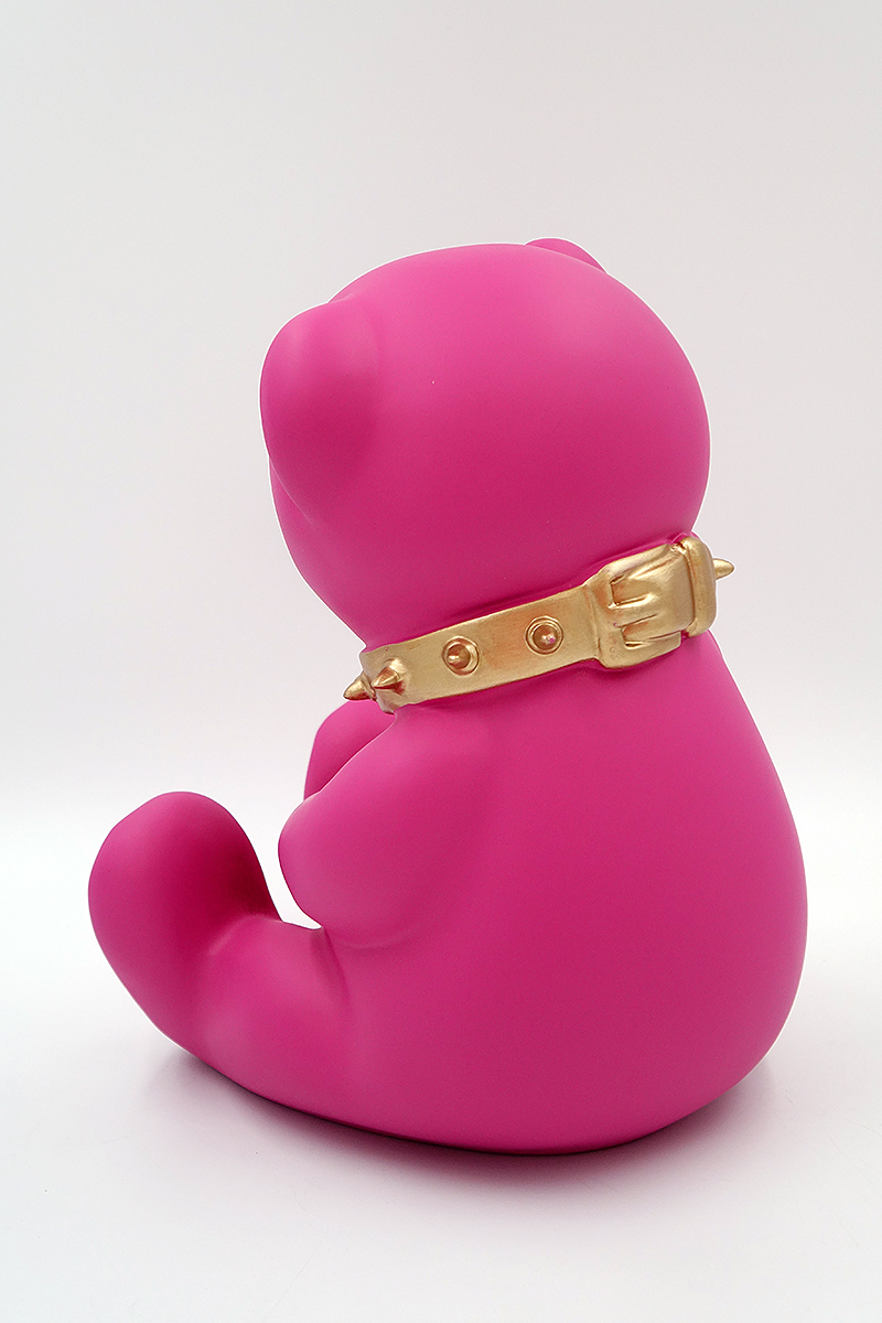 Bear H-31 cm - pink matte 2 Bright pink teddy bear figurine sitting, wearing a golden spiked collar.