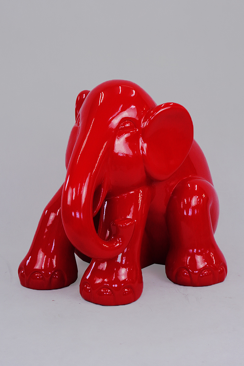 Sitting Elephant L - Painted 1 Red glossy elephant figurine with a reflective surface against a plain background.