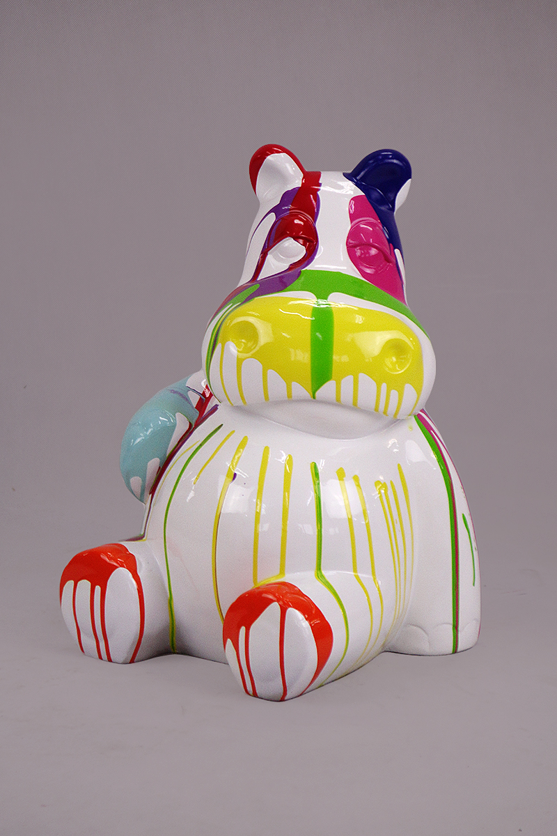 Hippo 40cm - white trash 1 Colorful abstract hippo sculpture with dripping paint in shades of blue, red, green, yellow, and purple.