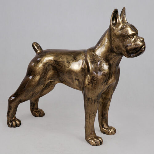 Bronze sculpture of a standing dog with cropped ears and a docked tail.