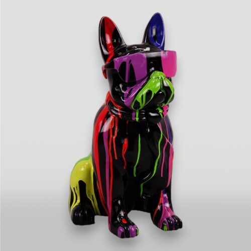 Colorful, abstract sculpture of a sitting dog wearing sunglasses, with vibrant paint drips in green, pink, blue, and yellow on a glossy black surface.