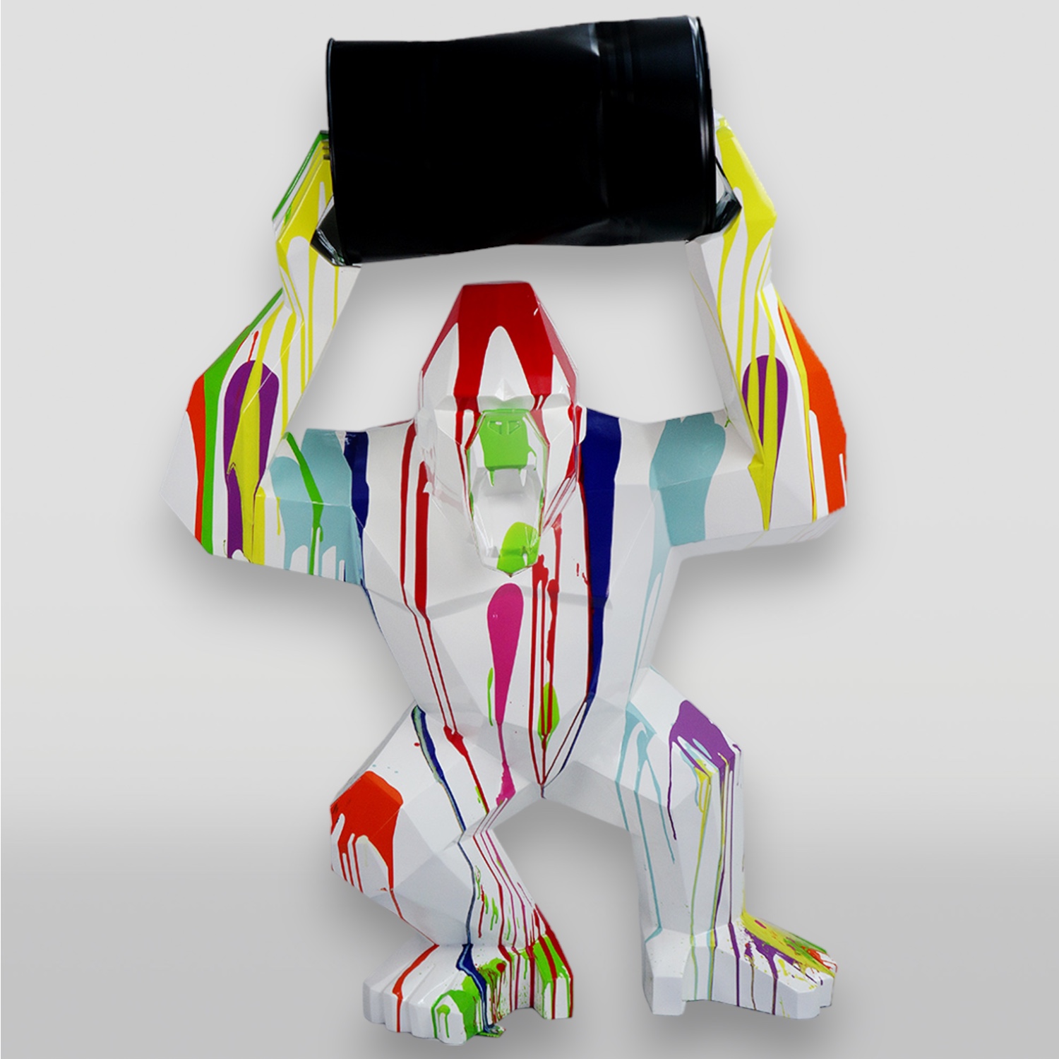 Gorilla Tono Square XL - White Trash 1 Colorful sculpture of a gorilla holding a black barrel, with vibrant paint drips covering the figure.