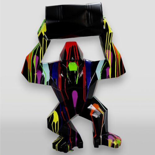 Abstract geometric gorilla sculpture holding a barrel, painted with colorful dripping lines.
