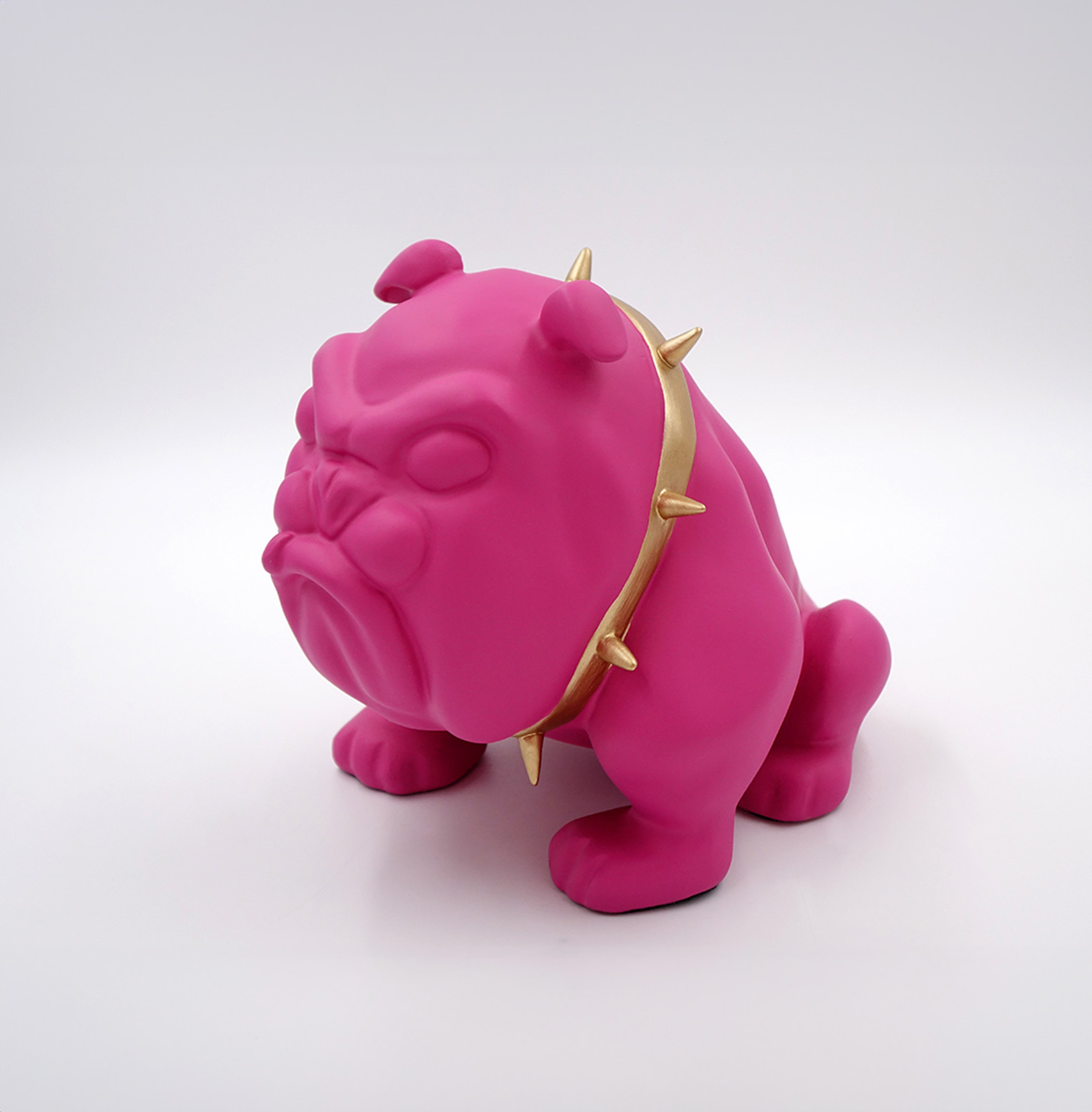 Dog Bulldog Avella 22cm - Matte Pink 1 Pink bulldog figurine with a gold spiked collar against a white background.