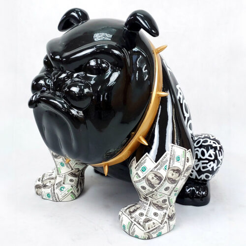 Sculpture of a black bulldog with a gold spiked collar, legs covered in dollar bills, and graffiti-style text on its rear.