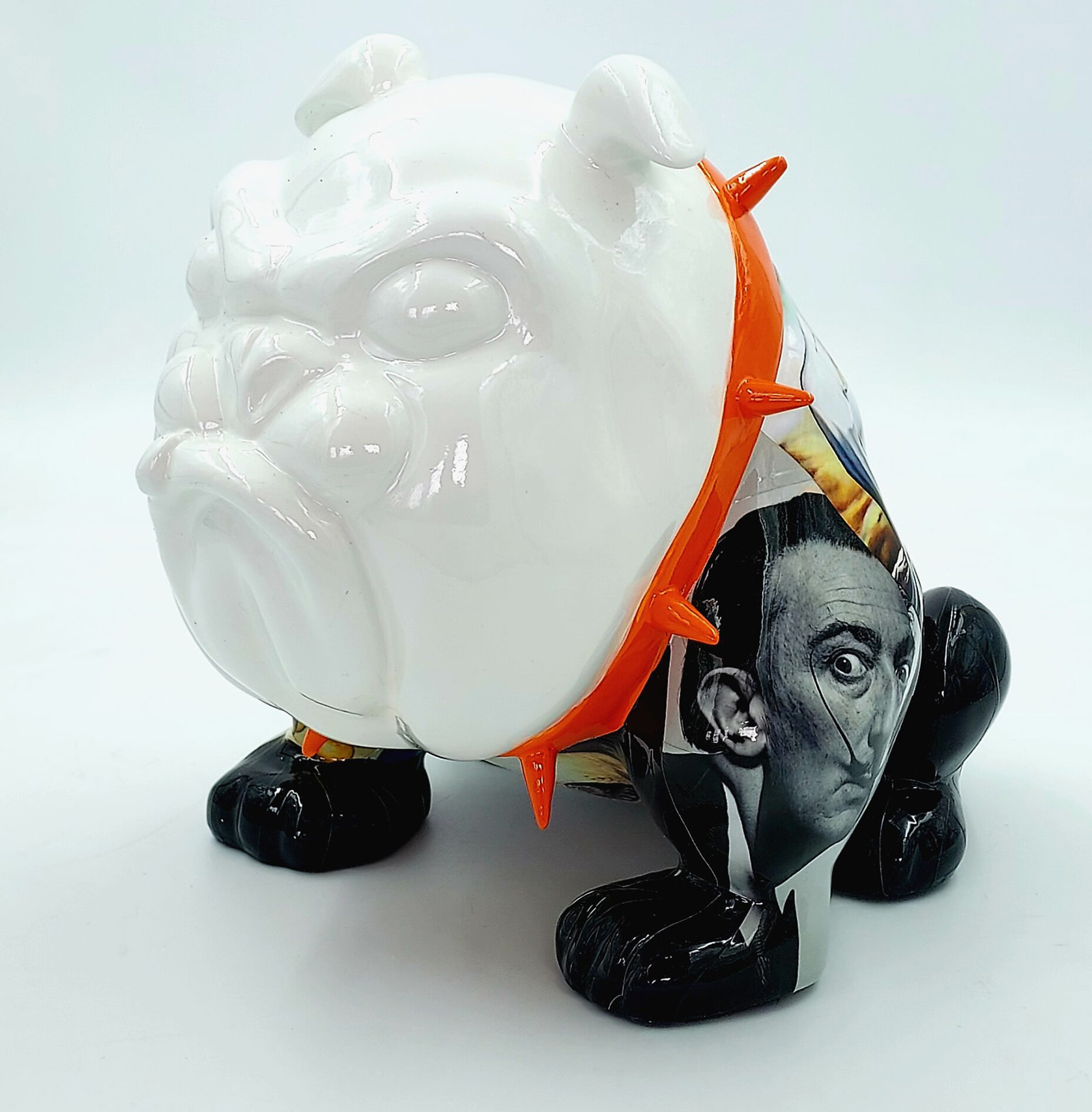 Bulldog Avella 55cm dog - Mustache 1 Ceramic bulldog figurine with an orange spiked collar and black-and-white artistic prints.
