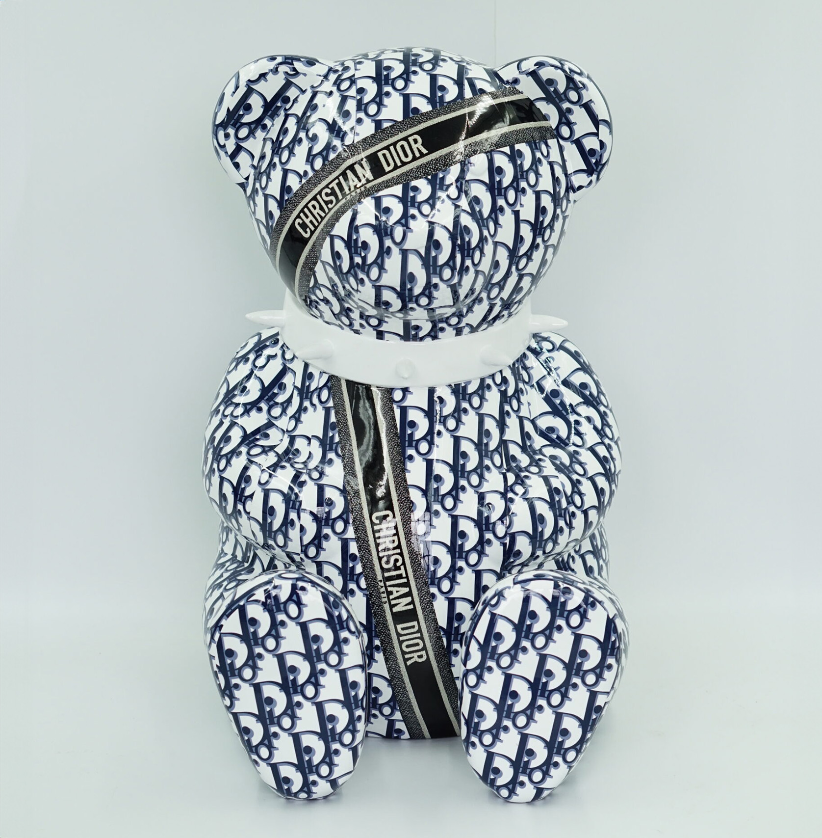 Bear CD H-45cm 1 A Christian Dior pattern-covered teddy bear with a black ribbon bearing the text