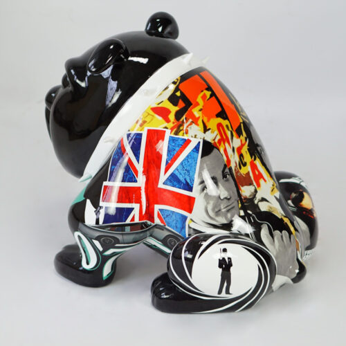 Decorated figurine of a bulldog featuring the Union Jack, a black-and-white portrait, and thematic graphics.