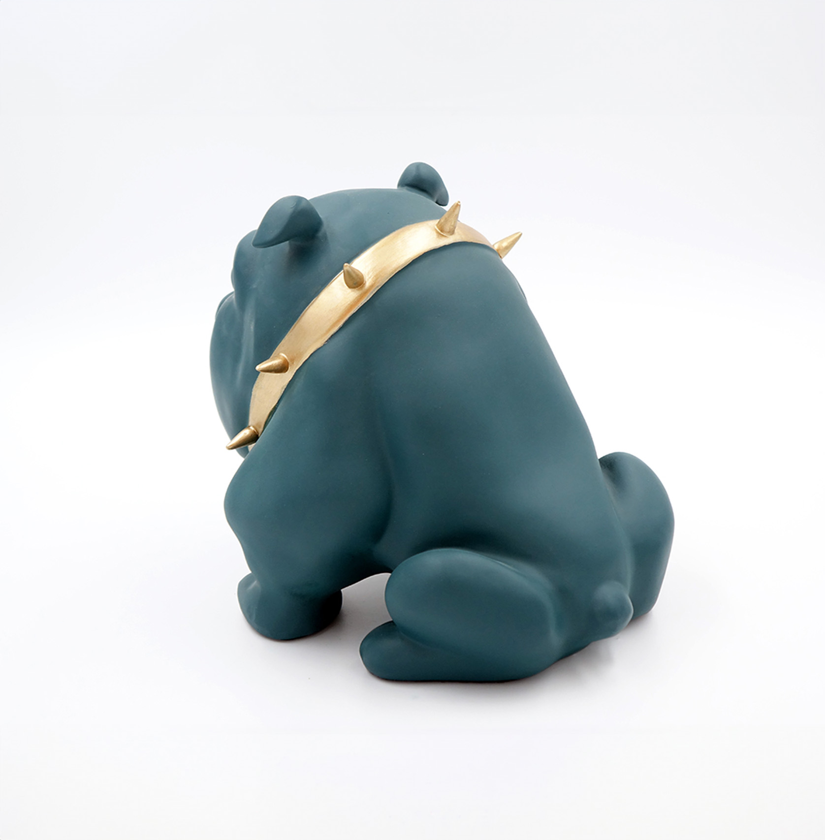 Dog Bulldog Avella 22cm - Matte Green 2 A navy blue bulldog figurine wearing a gold spiked collar sitting on a white surface.