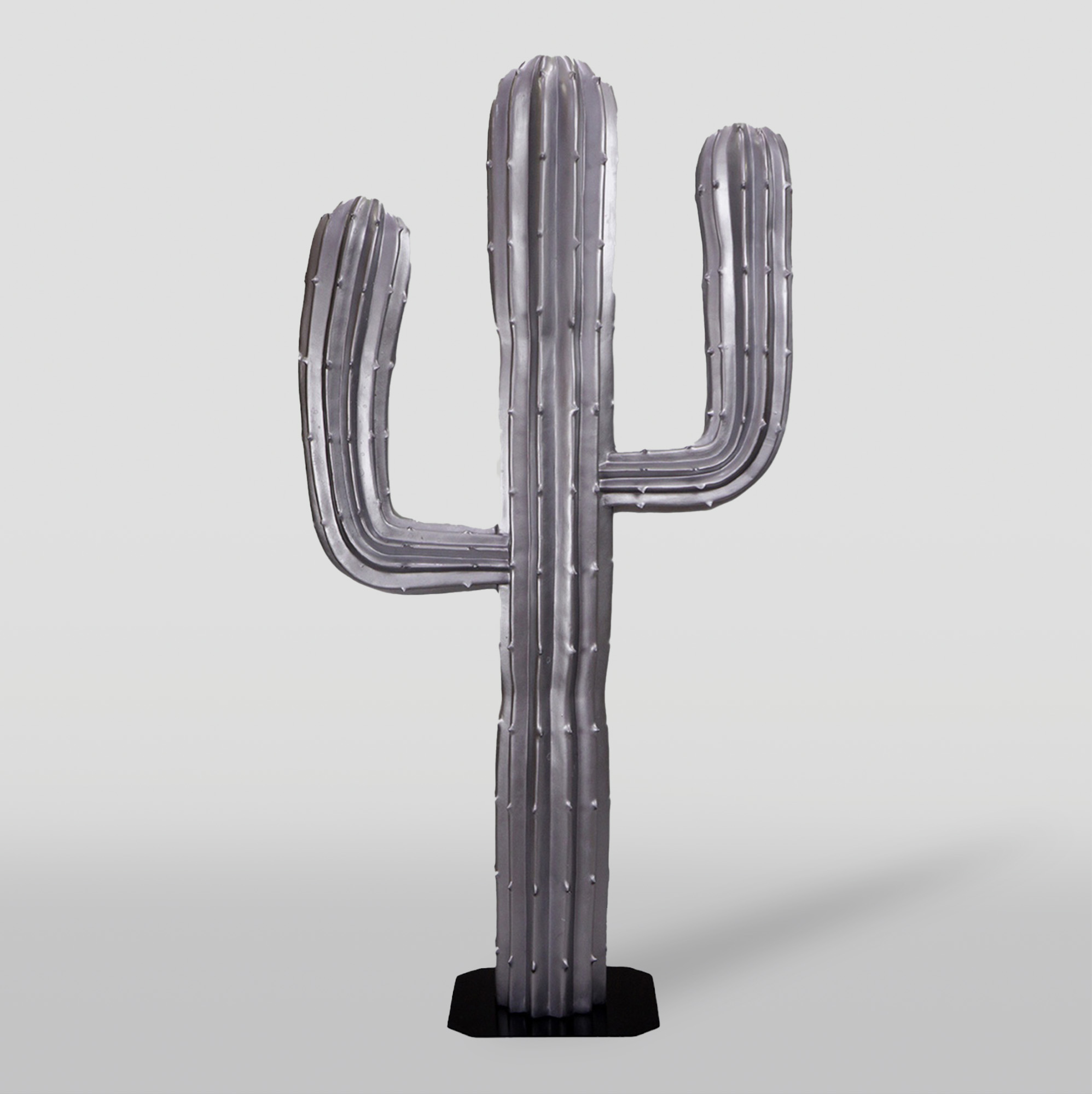 Cactus 180 cm - silver 1 Silver metallic sculpture of a cactus with three arms on a plain background.