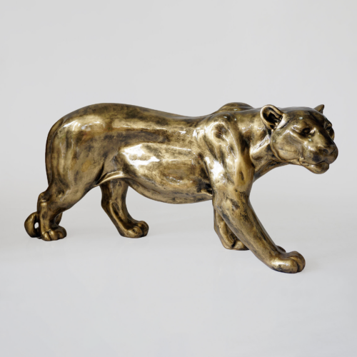 Bronze sculpture of a panther in a walking pose against a plain background.
