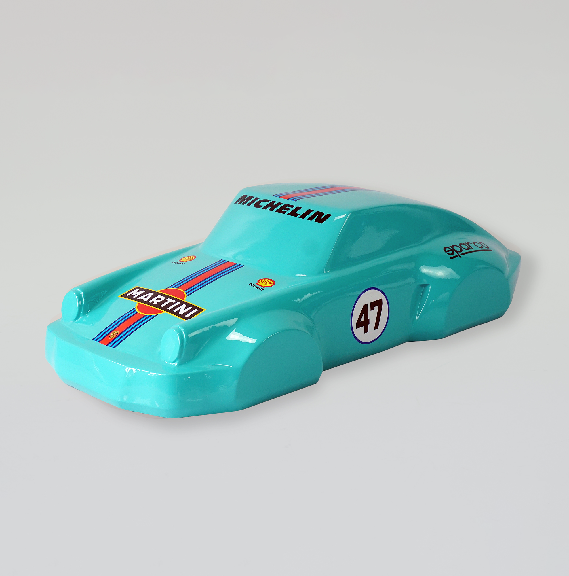 Car model 911 - motif 47 blue 1 A turquoise toy car model with racing decals, including