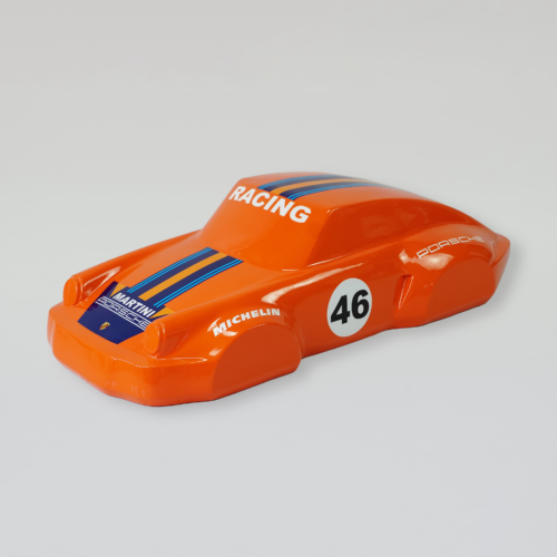 Orange toy race car with blue and black stripes, marked with 