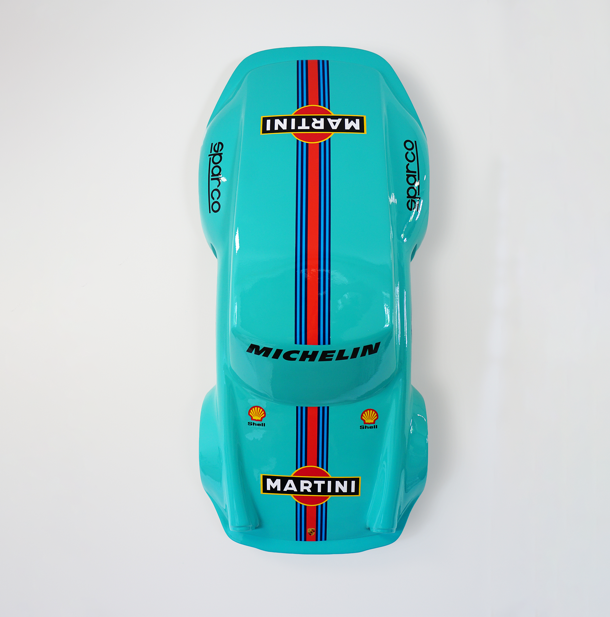 Car model 911 - motif 47 blue 3 Top view of a blue toy race car with Martini Racing and Michelin logos.