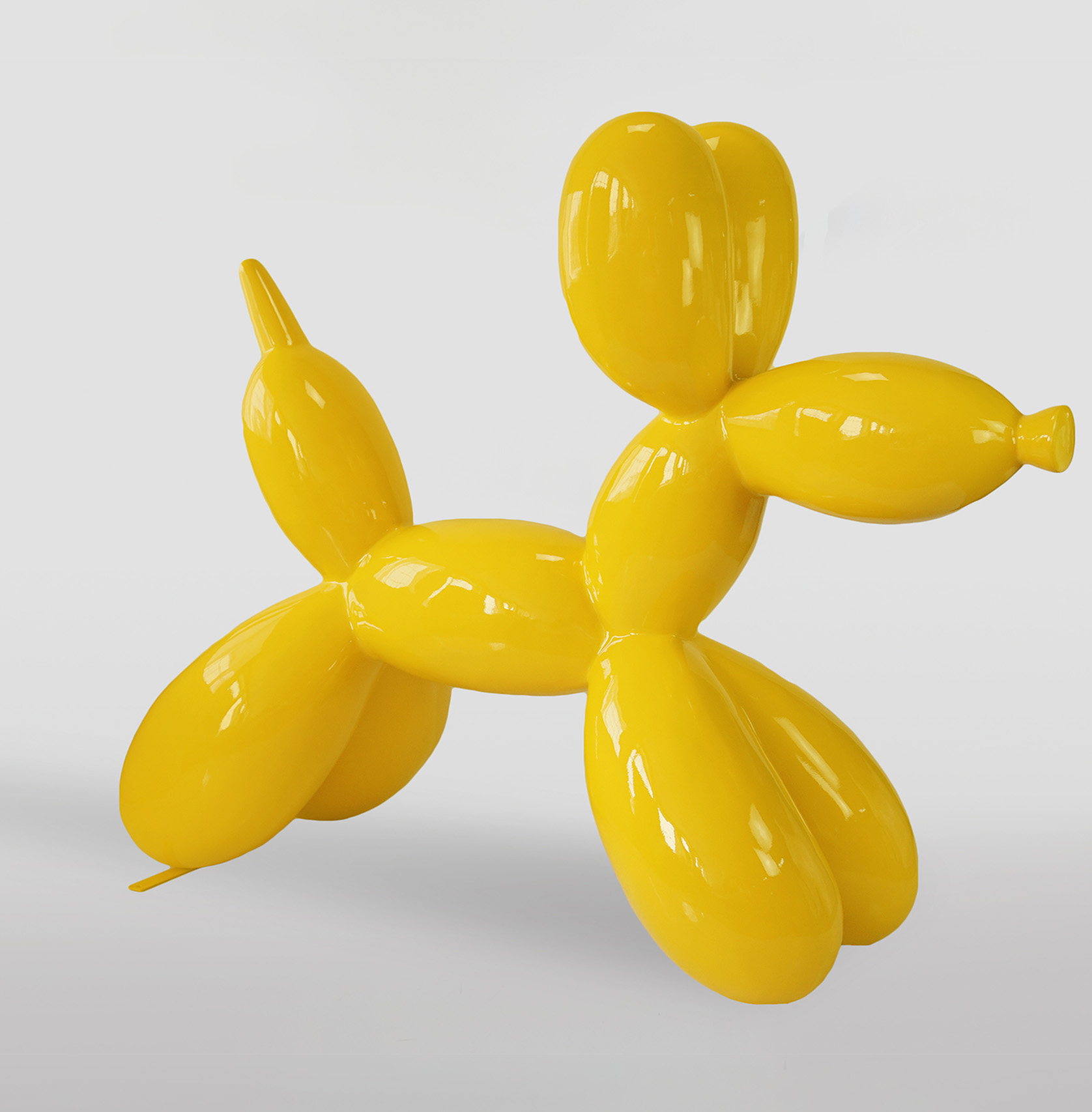 Balloon Dog - Large Decorative Figure - Yellow 1 Yellow balloon dog sculpture against a light background.