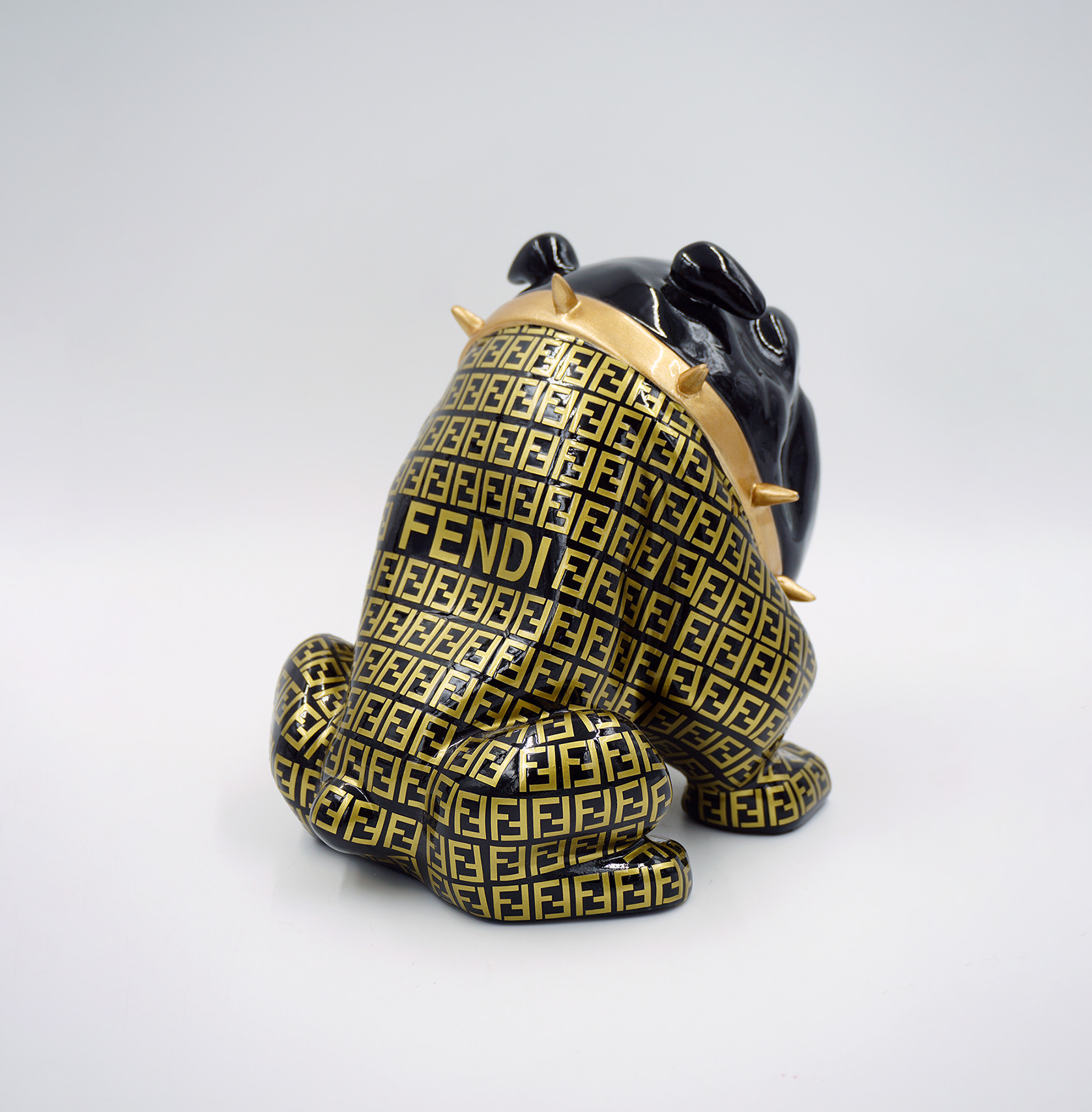 Bulldog Avella dog 22cm - wrapped motif F 2 Ceramic dog figurine with black and gold Fendi logo pattern wearing a gold spiked collar.