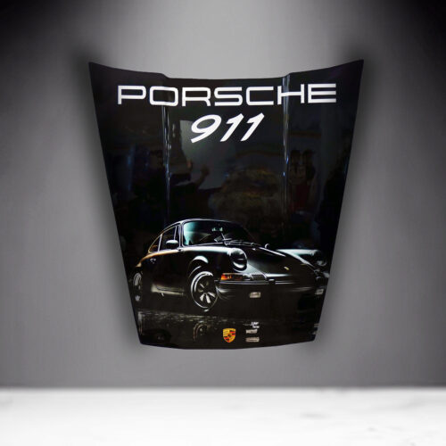 Porsche 911 car hood with a picture of the classic model and the Porsche logo.