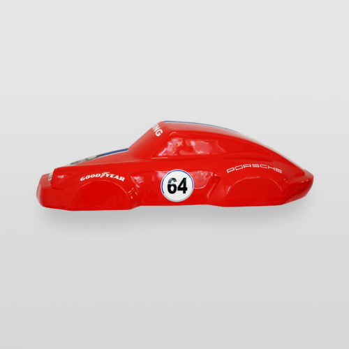 Red toy car model with the number 64, Goodyear logo, and 