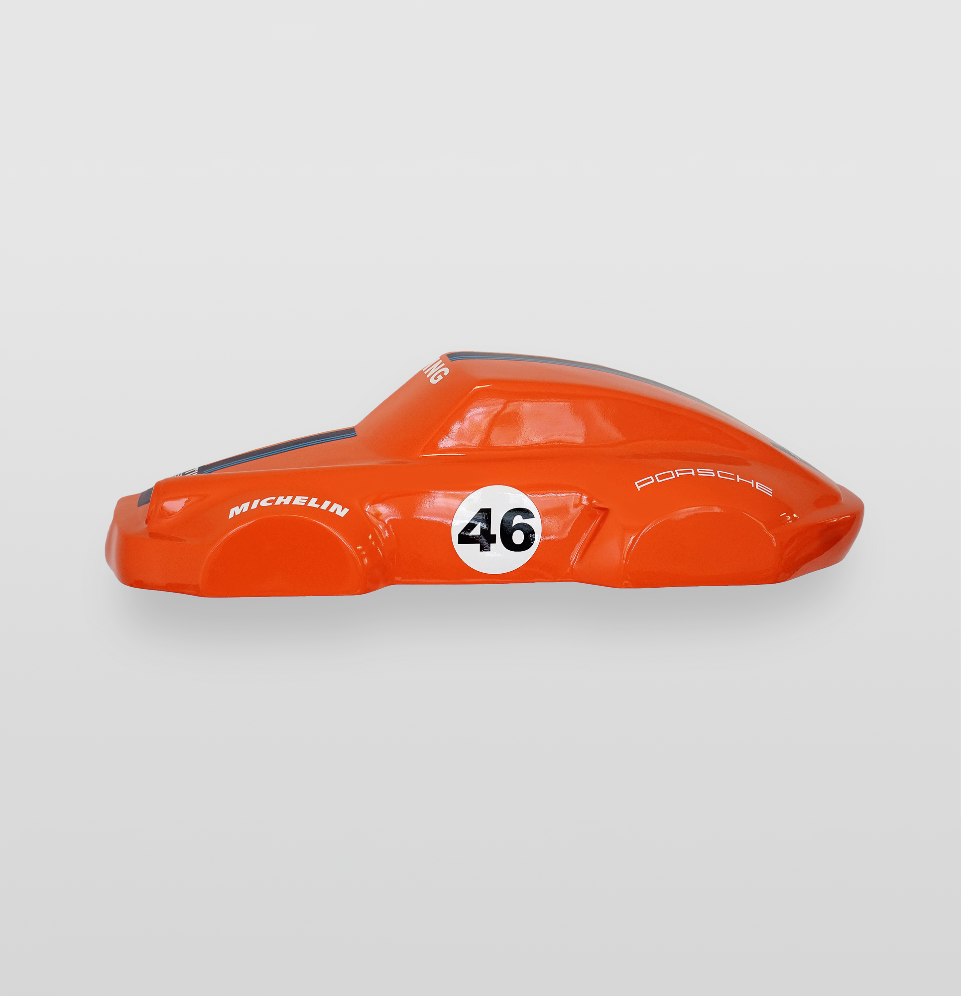 Car model 911 - Motif 46 - Half model 1 Orange toy car with number 46 and Michelin branding on the side.