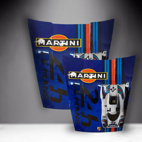 Two blue vehicle panels with Martini and Le Mans branding, featuring multicolored stripes and a white car graphic.